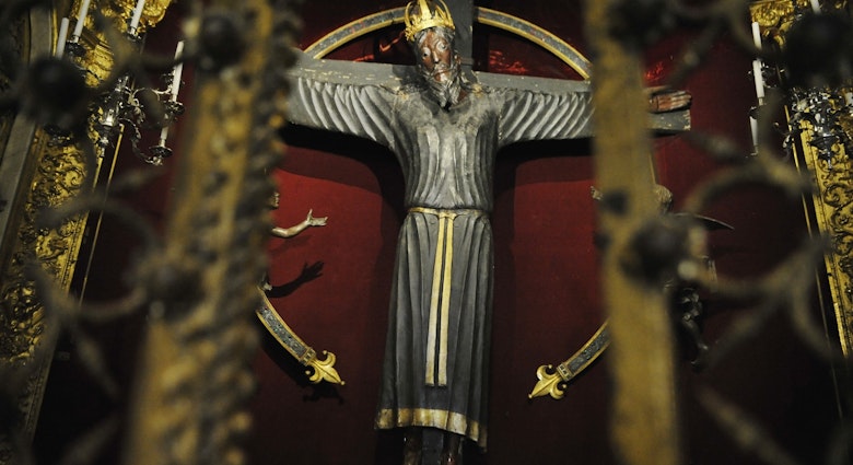 LUCCA, ITALY - JUNE 19: The true Volto Santo di Lucca ('Holy Face of Lucca') and oldest statue of the West in the Cathedral of Lucca on June 19, 2020 in Lucca, Italy. The crucifix of the Holy Face is the first and the original and not a copy as previously believed. Diagnostic investigations using carbon 14 revealed that the three-meter sculpture is the 8th century original that a legend claimed to have arrived in Lucca from the Holy Land in 782 AD and not a 12th century copy. According to legend, the statue was carved by Nicodemus and the face carved by divine hand. This extraordinary novelty makes it the oldest wooden statue in the entire West. Over the centuries the statue had always been venerated and loved by pilgrims of all Italy and the world. The diagnostic tests were carried out on the occasion of the celebrations for the 950 years since the founding of the Lucca Cathedral. (Photo by Laura Lezza/Getty Images)