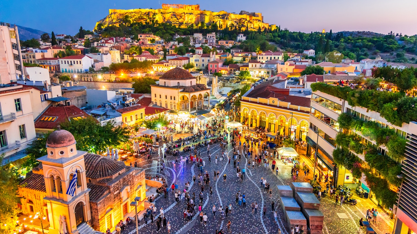 Crowd gathers at Monastiraki Square at night with the ancient Acropolis in the background.
1193397715
acropolis, aerial, ancient, ancient greece, architecture, athena, athens, athens by night, athens from above, attraction, capital, city, cityscape, civilization, classical, destination, europe, evening, famous, greece, greek, hellas, hellenic, heritage, history, holiday, illuminated, landmark, landscape, light, megalopolis, monastiraki, monastiraki athens, monument, mosque, night, panorama, parthenon, plaka, rock, ruins, scenic, square, sunset, temple, tourism, touristic, travel, urban, vacation