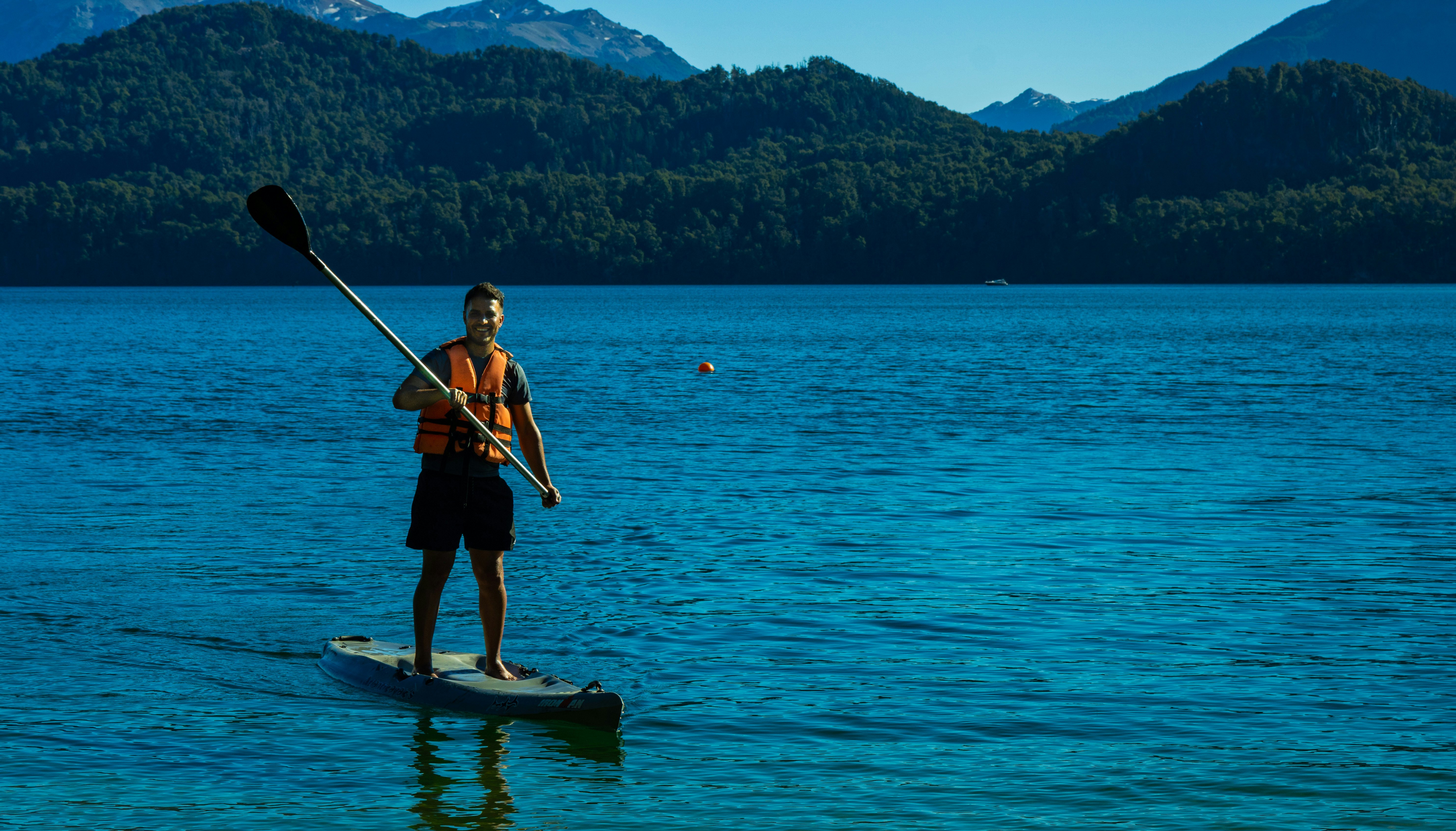 Elsewhere guide Lucas Kambic stand-up paddleboarding