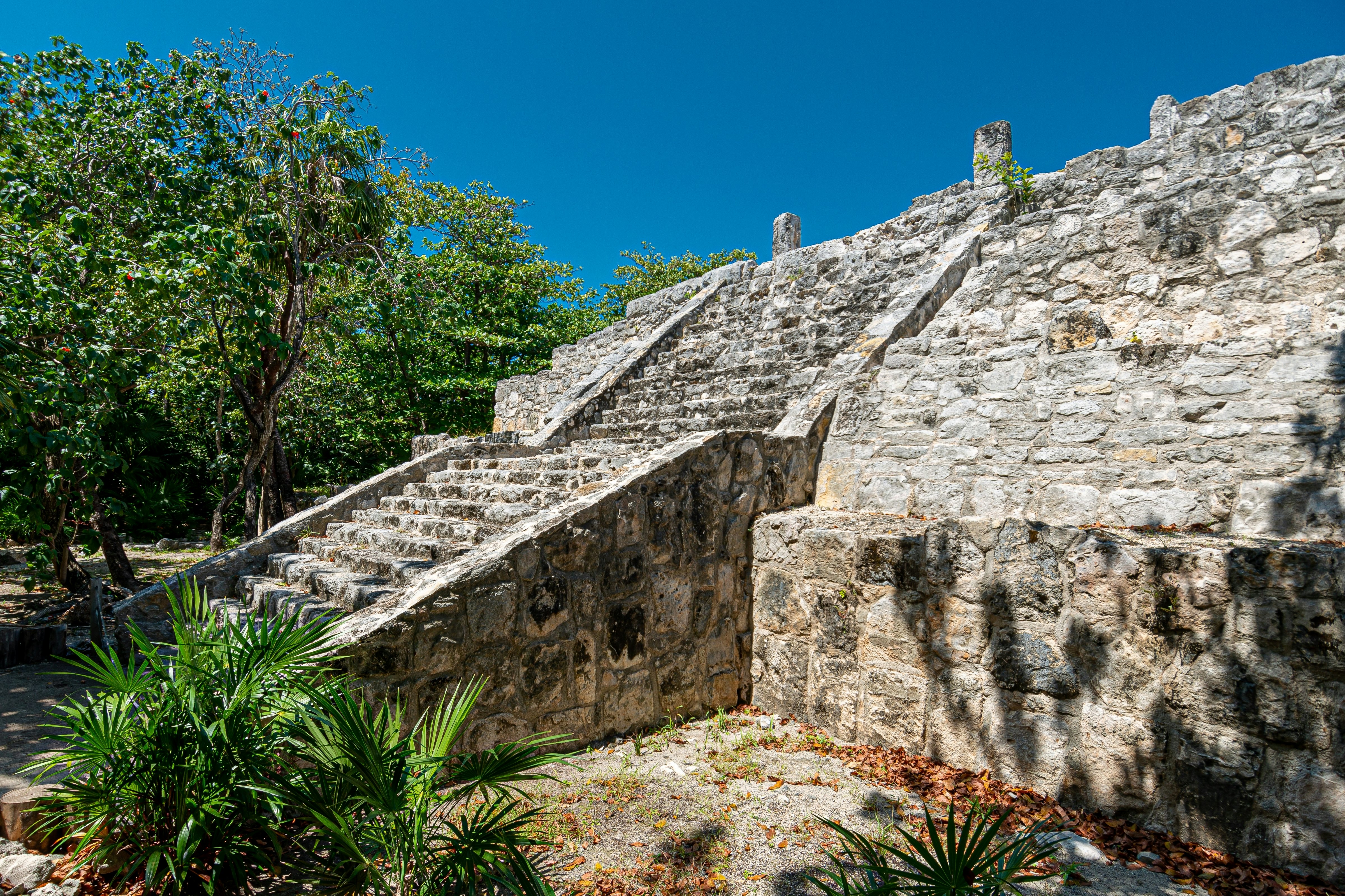 A view of a staircase leading up a Maya pyramid ruin outside of Cancún