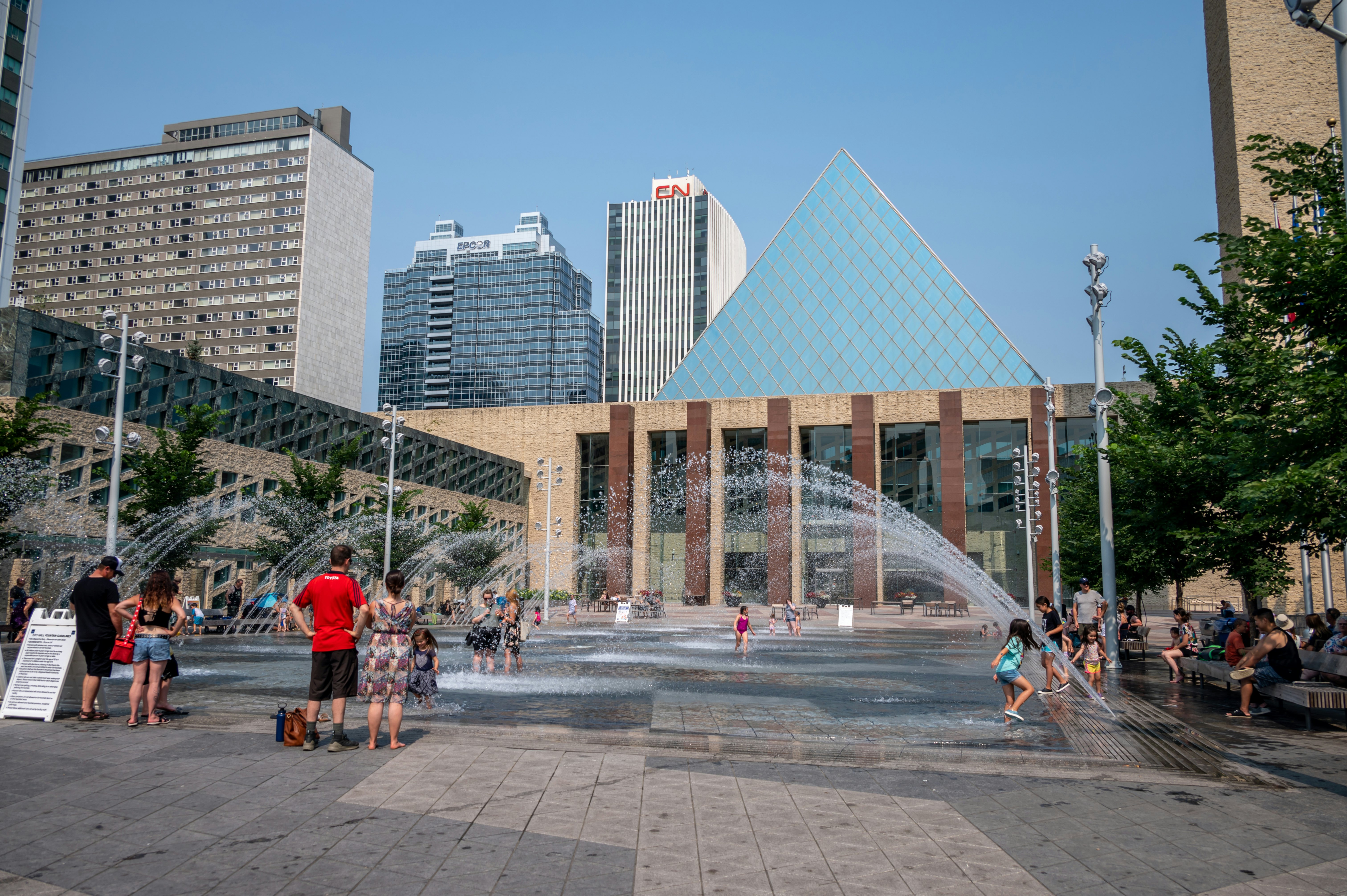 Edmonton, Alberta - July 30, 2021: People playing in the fountains in front of Edmonton city hall.
1332928844
canadian, children, city hall, hot day, kids, municipal building, splash park