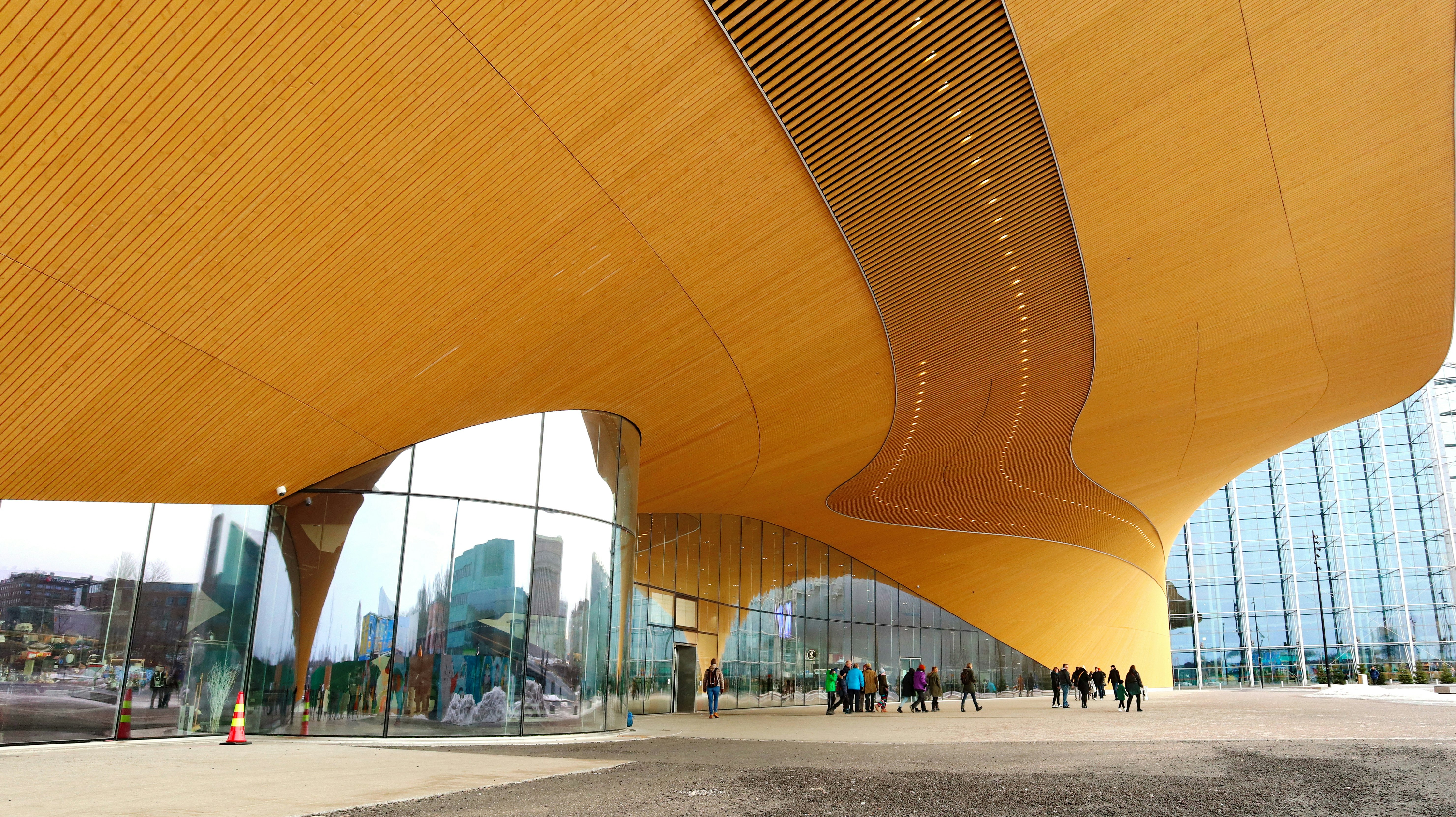 The curved wooden facade of a library building