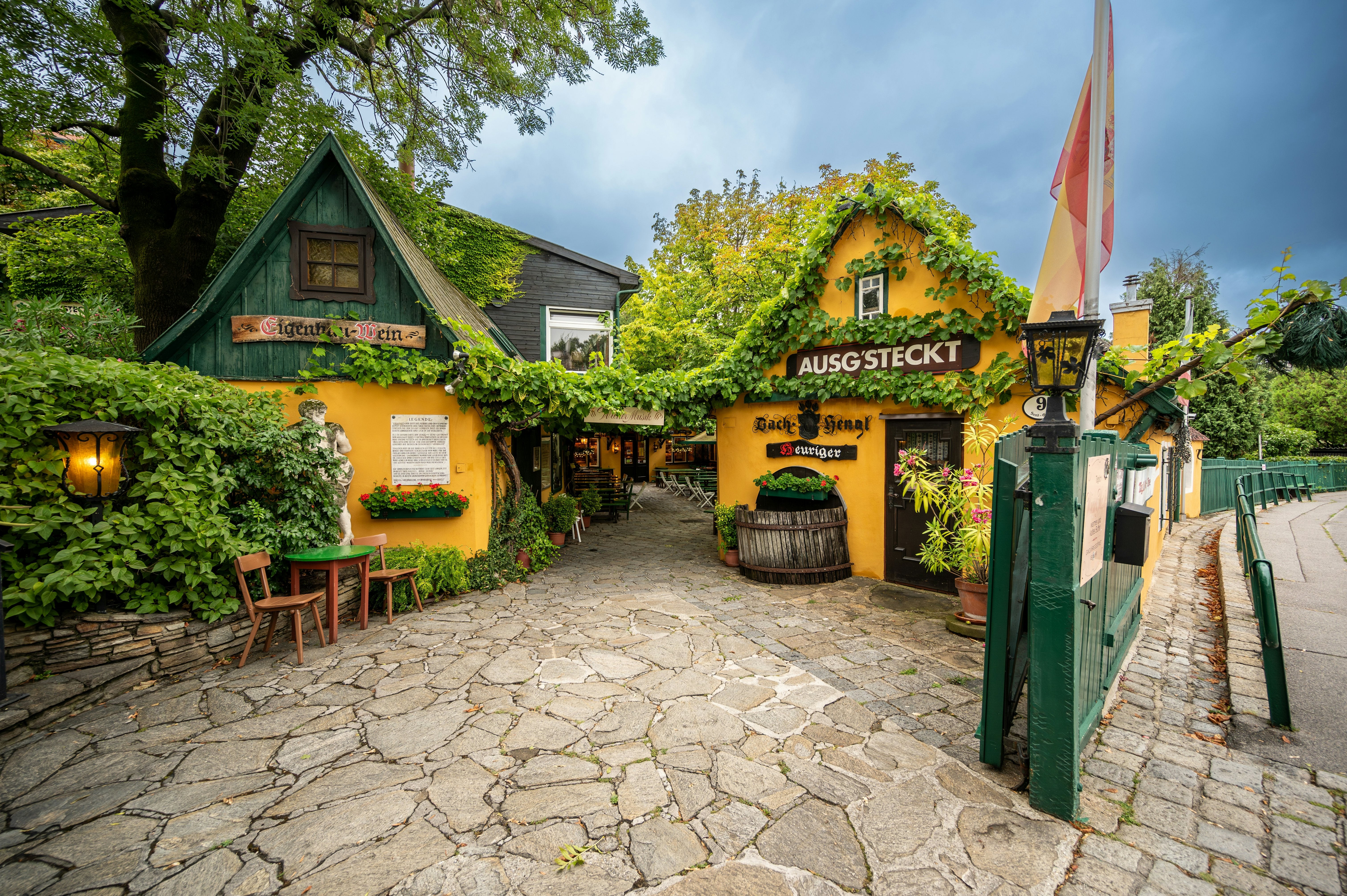 A quaint tavern covered in plants